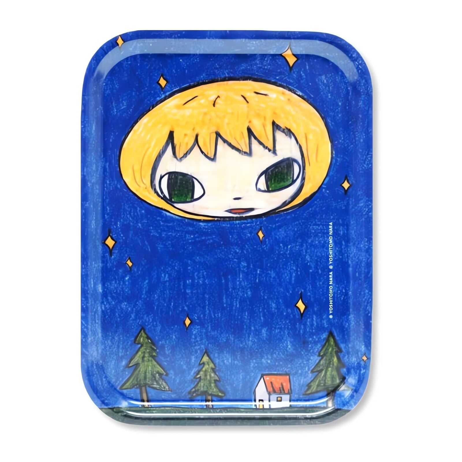 A small tray with a drawing of a boy's face on it.