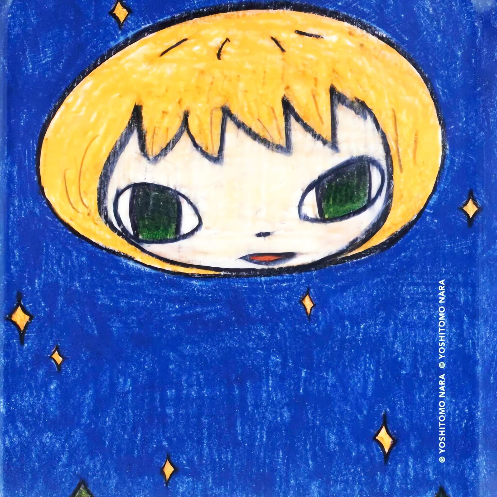 A small tray with a drawing of a boy's face on it.