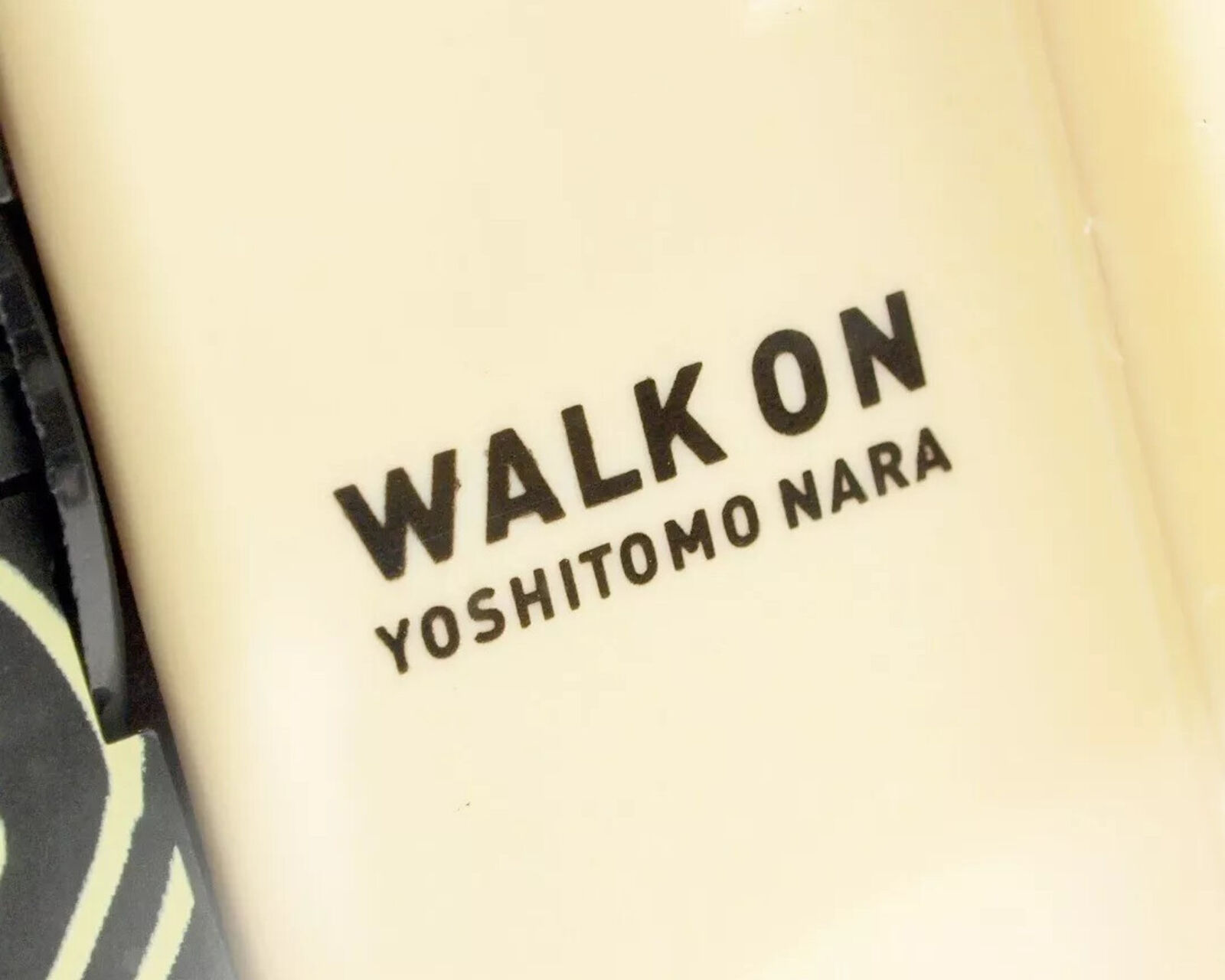 A digital clock with a picture of a man and a woman on it.