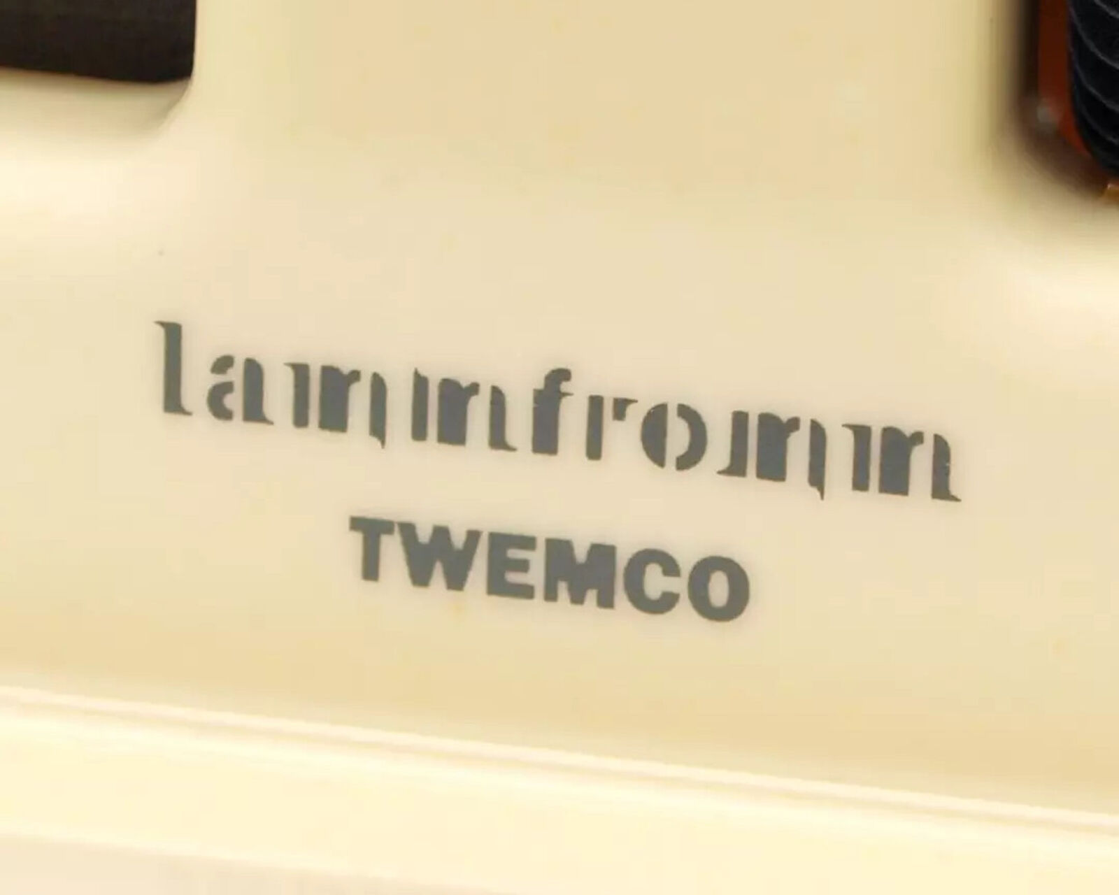 A digital clock with a picture of a man and a woman on it.