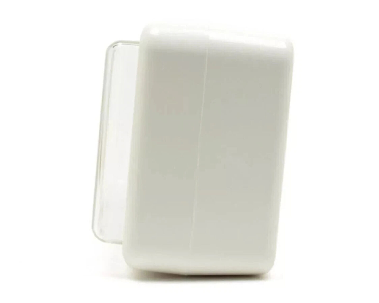 A white alarm clock with a picture of a man and a woman on it.