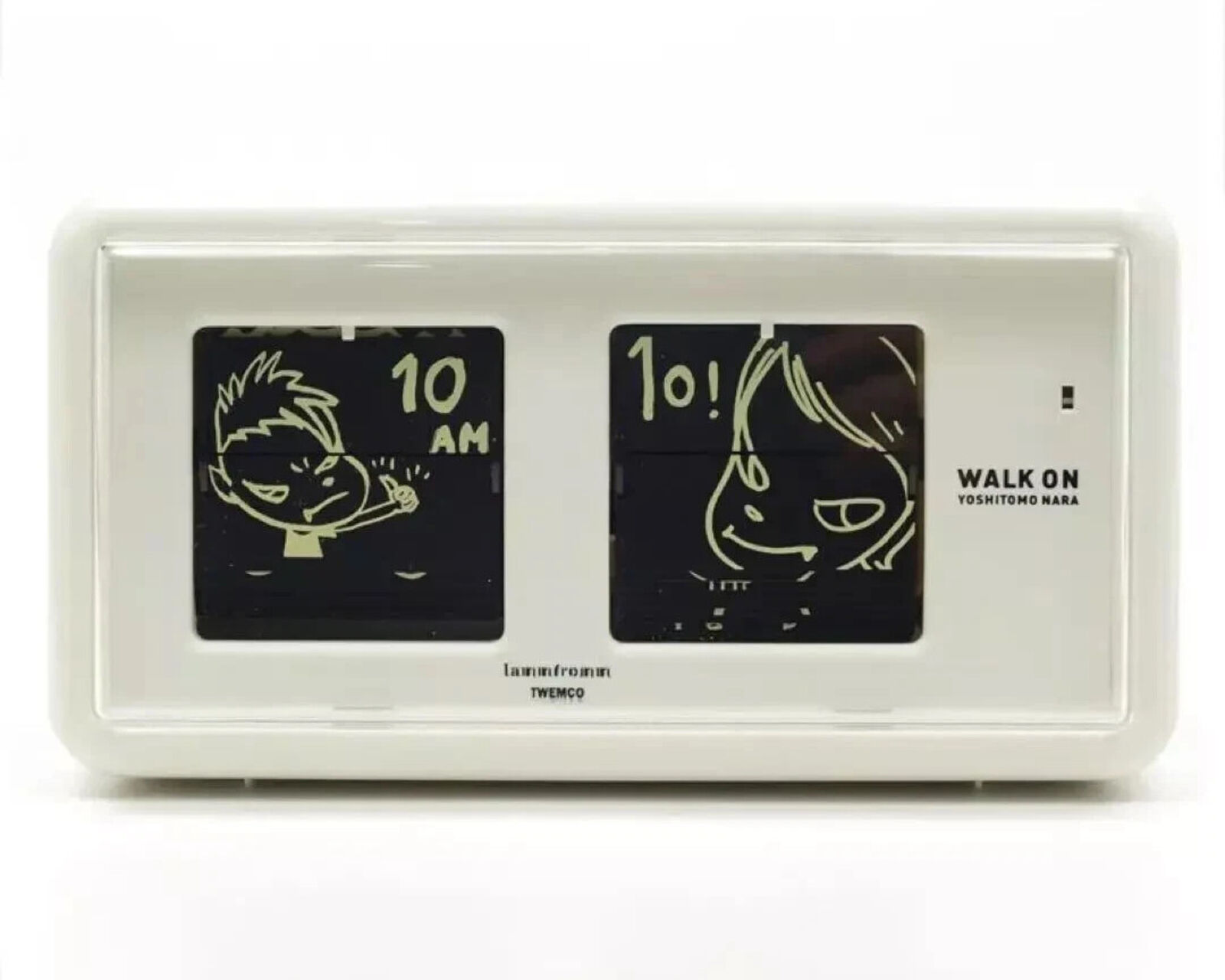 A white alarm clock with a picture of a man and a woman on it.