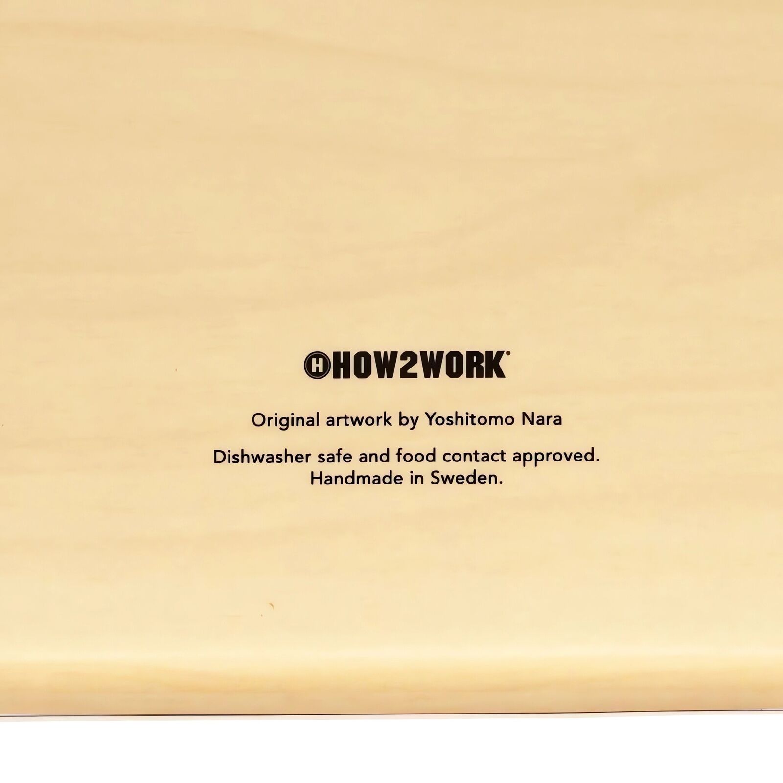 A tray with a drawing of a girl and two birds on it.