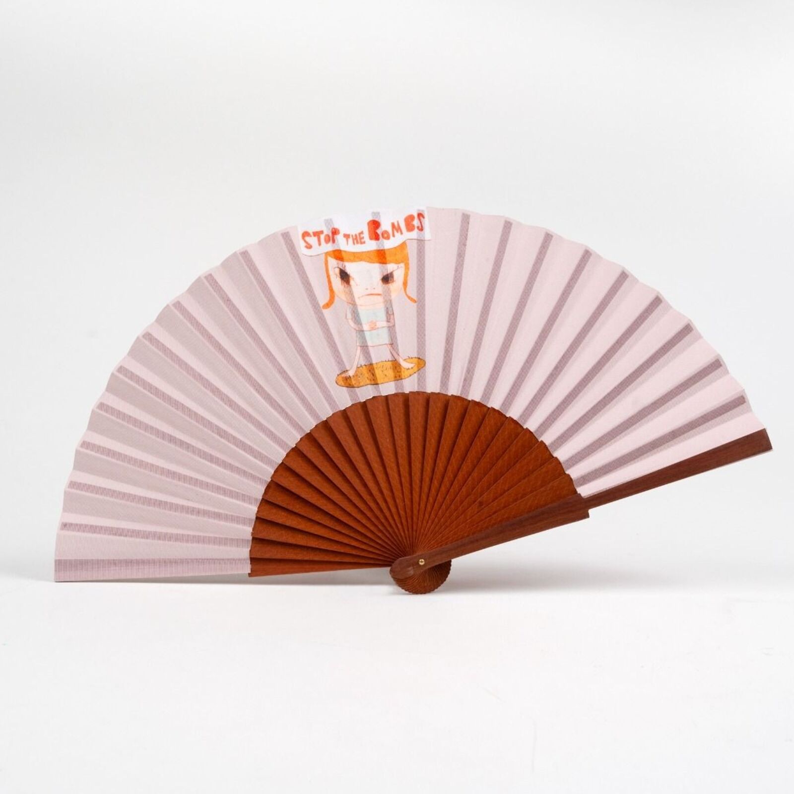 A pink and brown fan with a cartoon character on it.