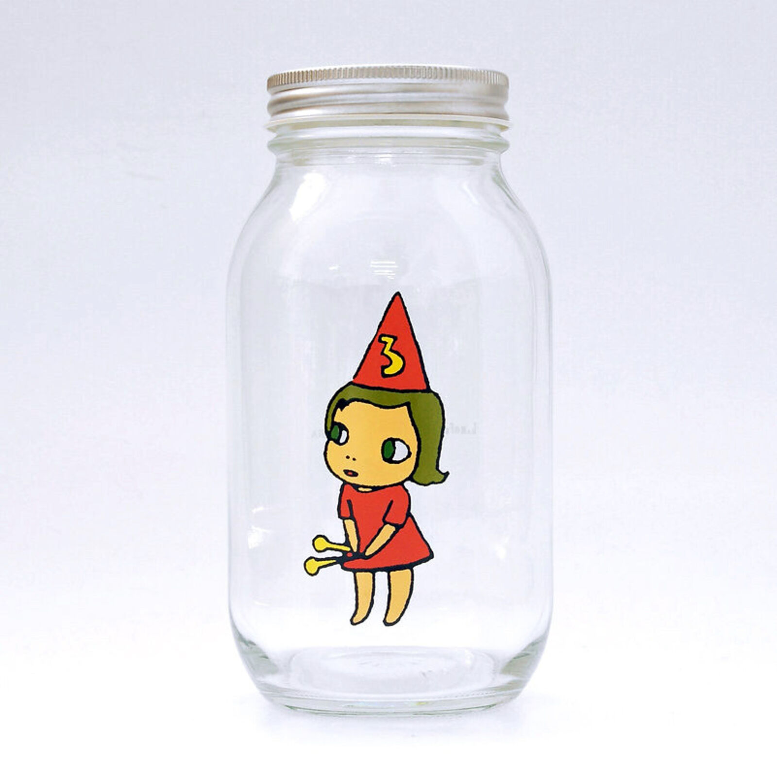 A set of three glass jars with cartoon characters on them.