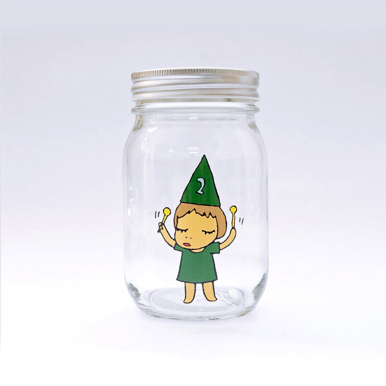 A set of three glass jars with cartoon characters on them.