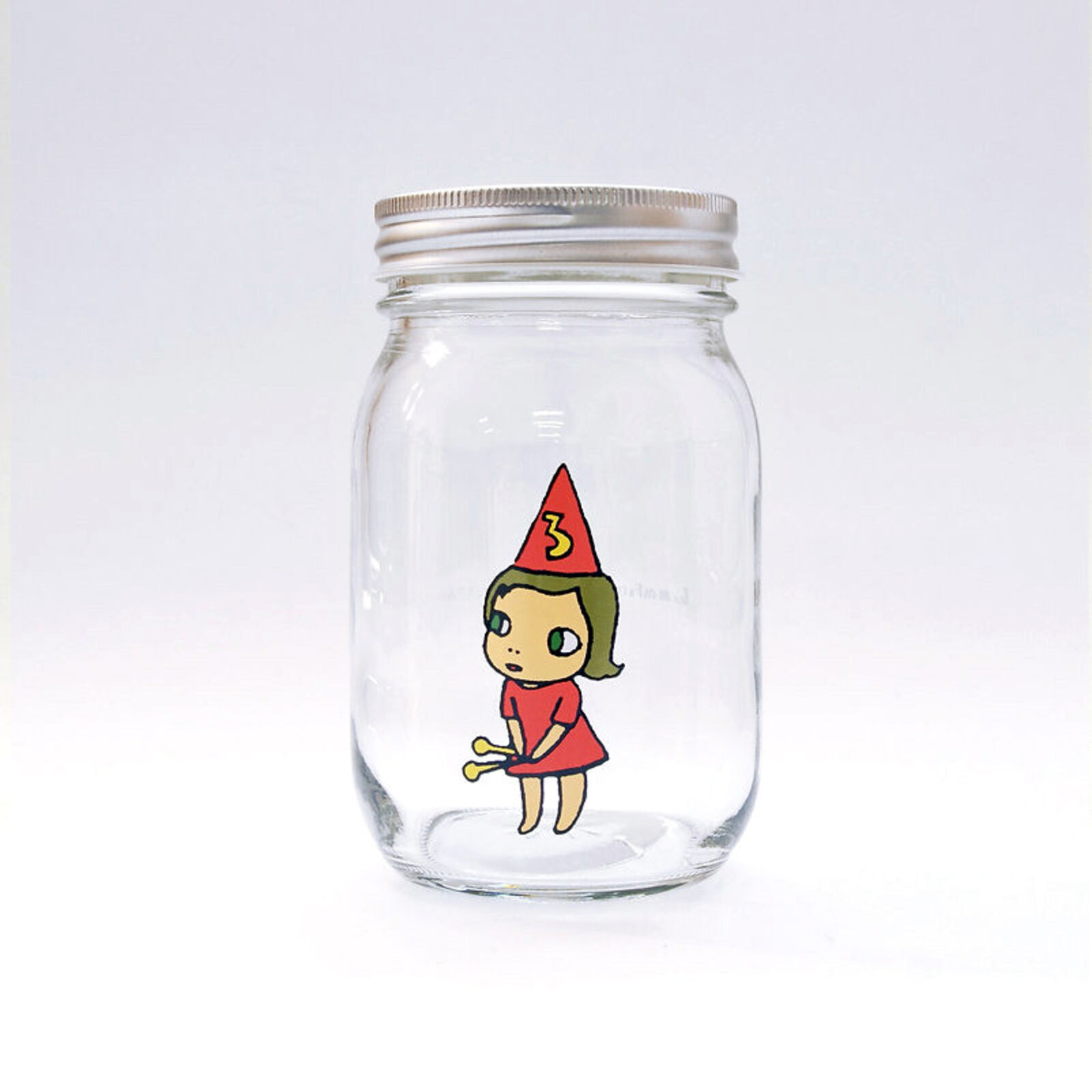 A set of three glass jars with cartoon characters on them.