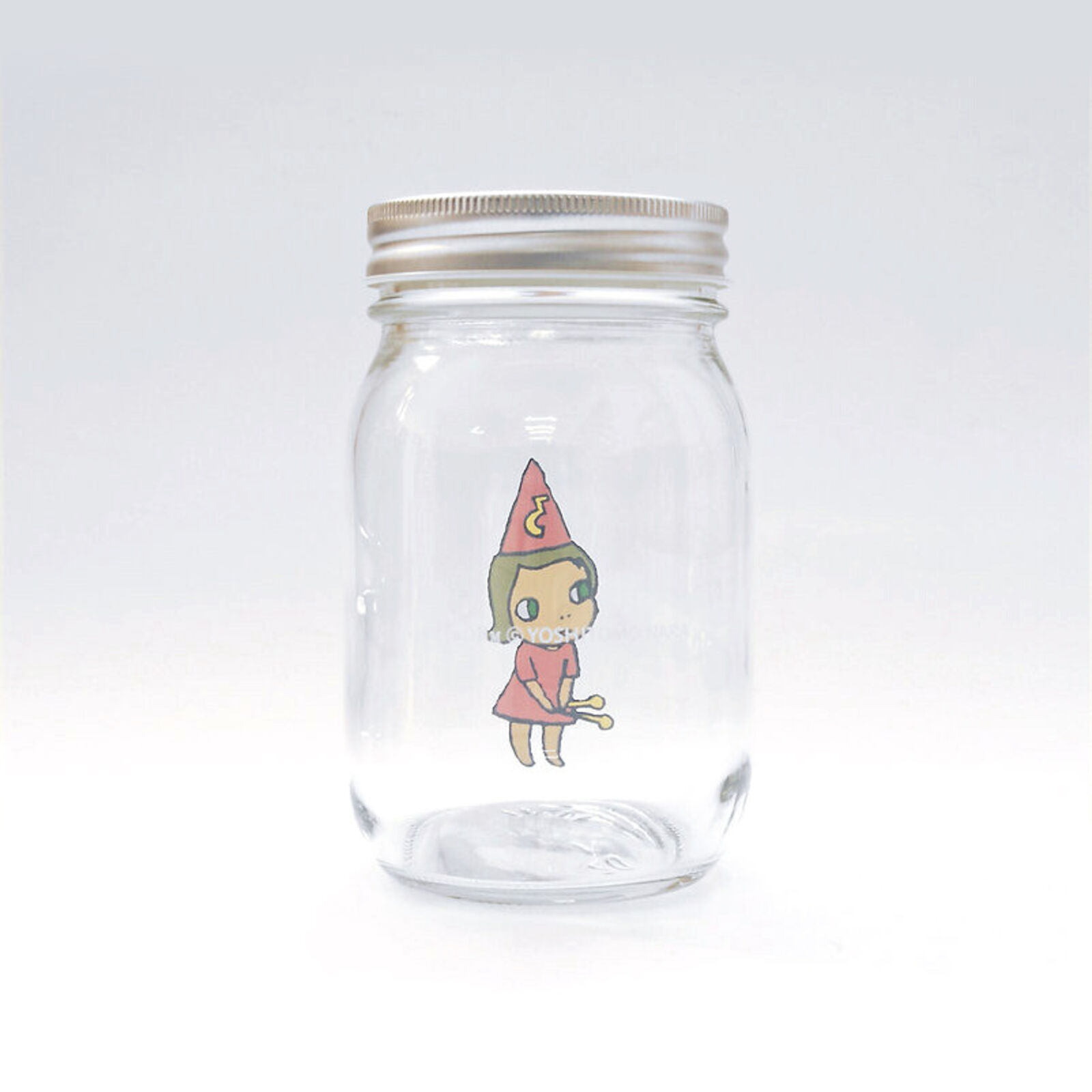 A set of three glass jars with cartoon characters on them.