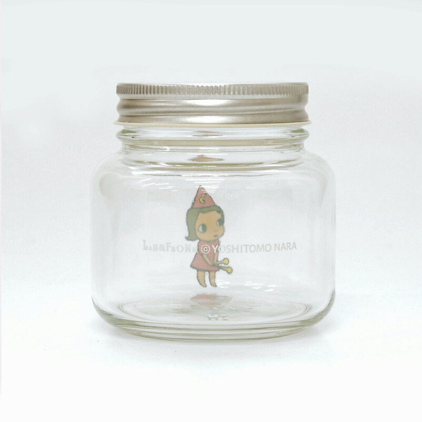 A set of three glass jars with cartoon characters on them.