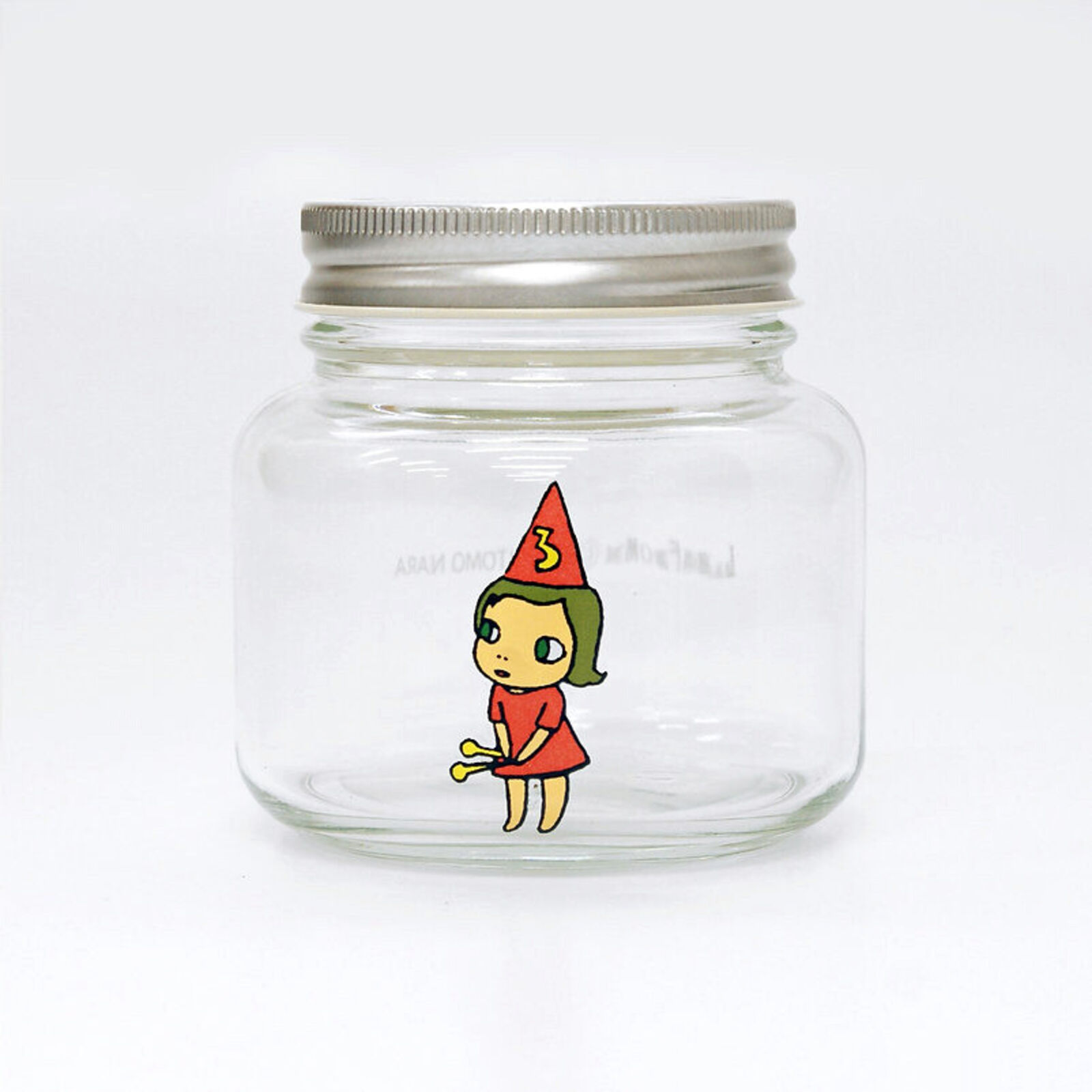 A set of three glass jars with cartoon characters on them.