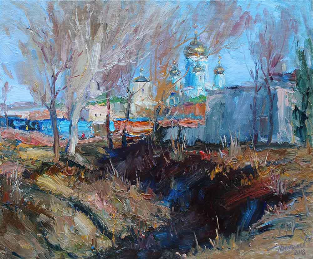 A vibrant landscape painting of a church complex viewed through bare trees.