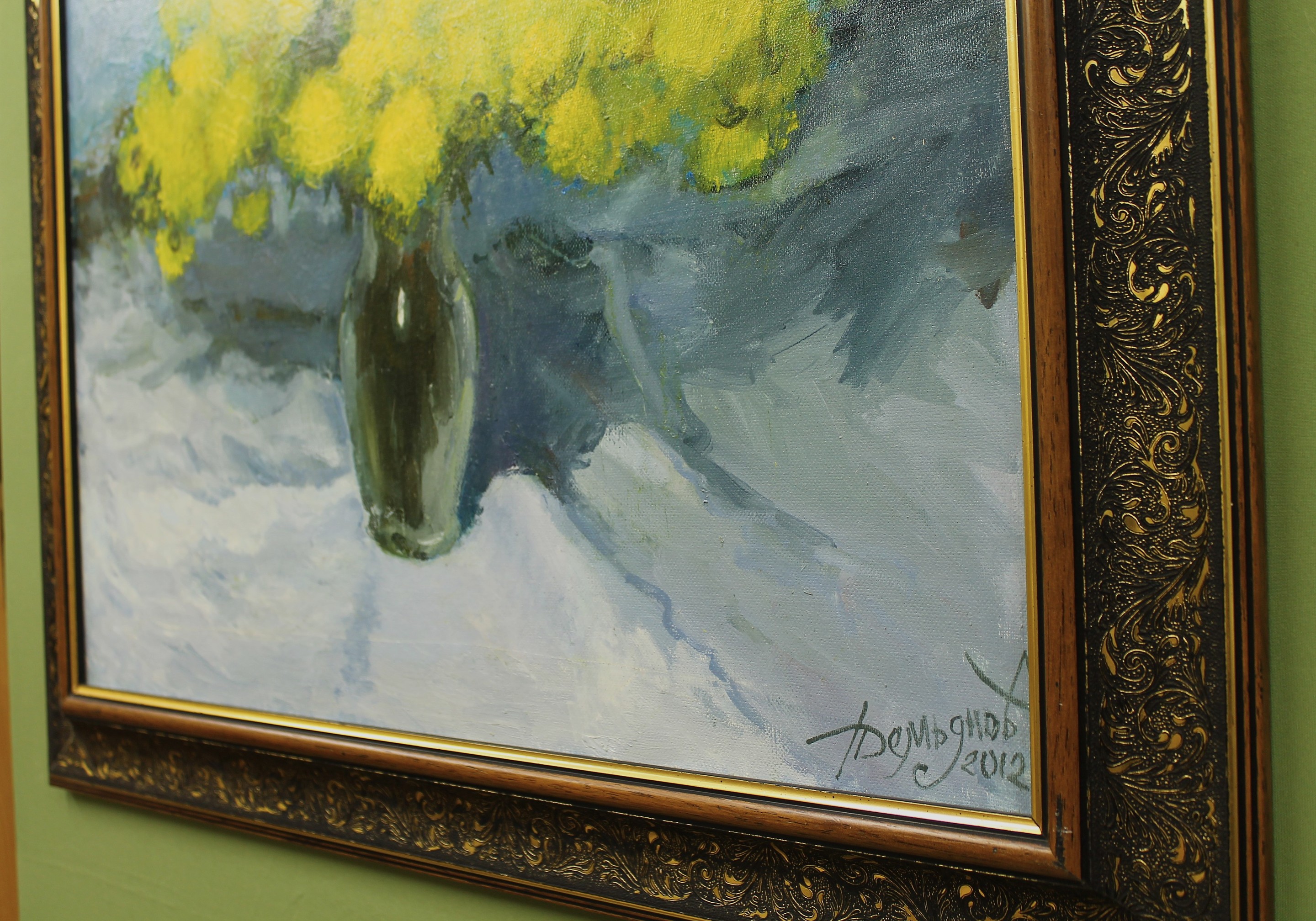 A vibrant still life featuring a vase of bright yellow flowers against a cool blue background.