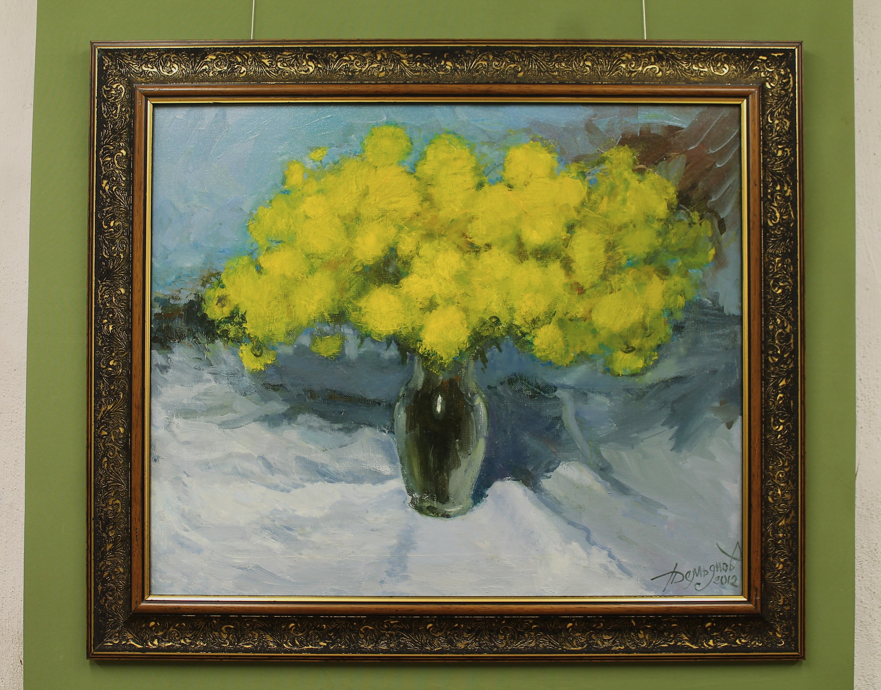 A vibrant still life featuring a vase of bright yellow flowers against a cool blue background.