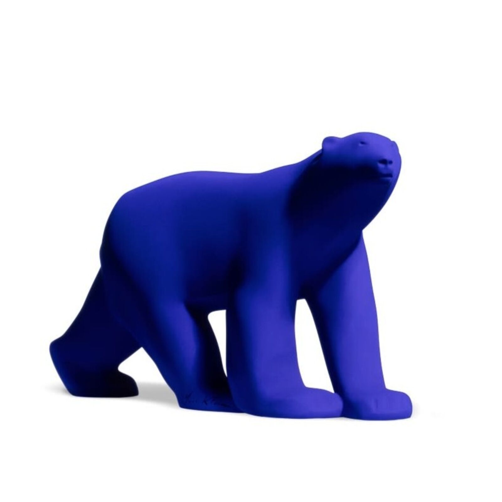 A smooth, matte blue sculpture of a four-legged animal in a walking pose.