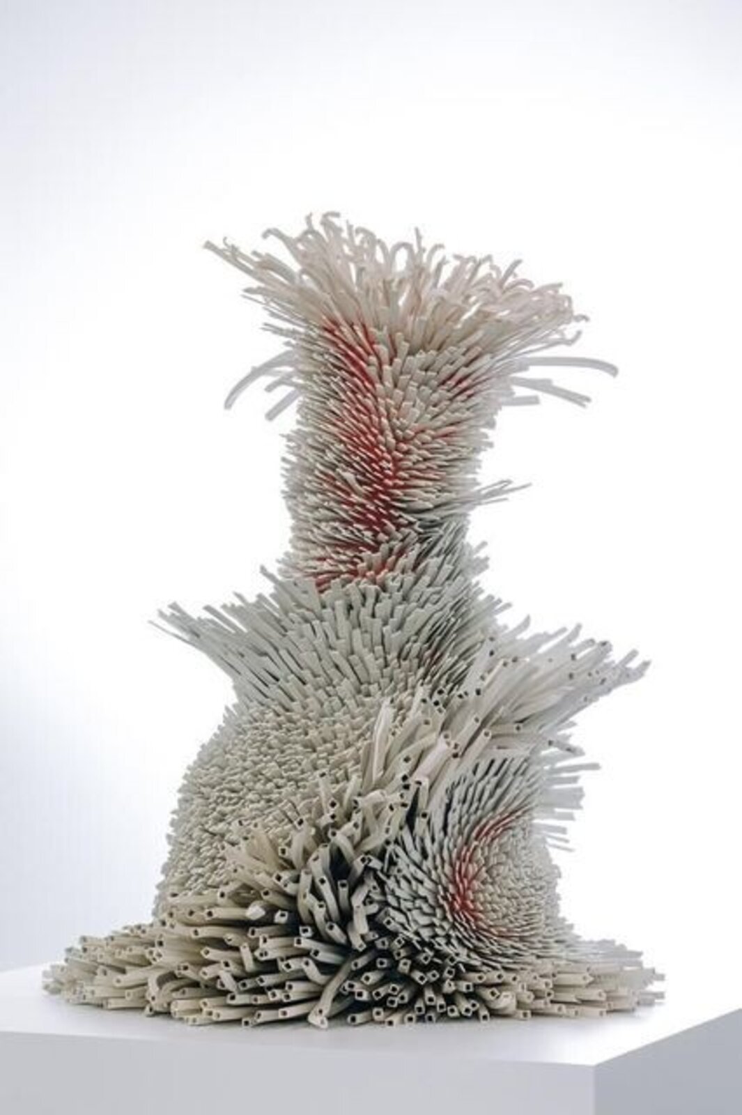 Artwork by Zemer Peled, New Year's Best Dream, Made of Ceramic porcelain shards, fired clay, mixed media, wooden pedestal 