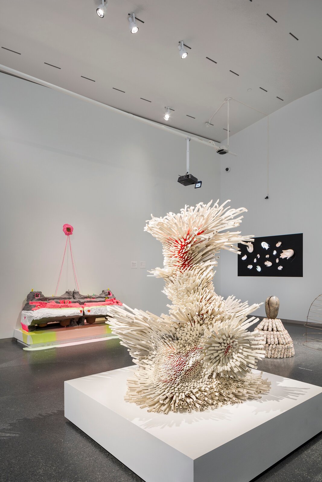 Artwork by Zemer Peled, New Year's Best Dream, Made of Ceramic porcelain shards, fired clay, mixed media, wooden pedestal 