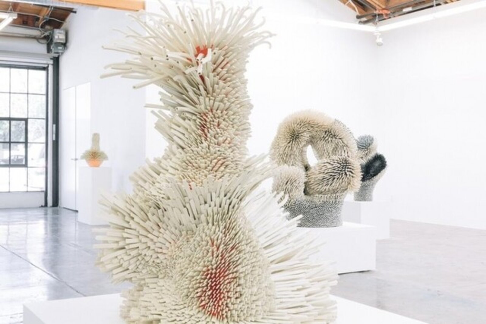 Artwork by Zemer Peled, New Year's Best Dream, Made of Ceramic porcelain shards, fired clay, mixed media, wooden pedestal 