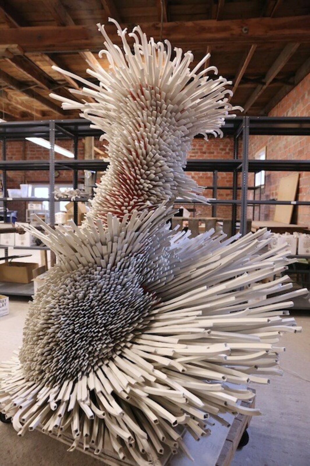 Artwork by Zemer Peled, New Year's Best Dream, Made of Ceramic porcelain shards, fired clay, mixed media, wooden pedestal 