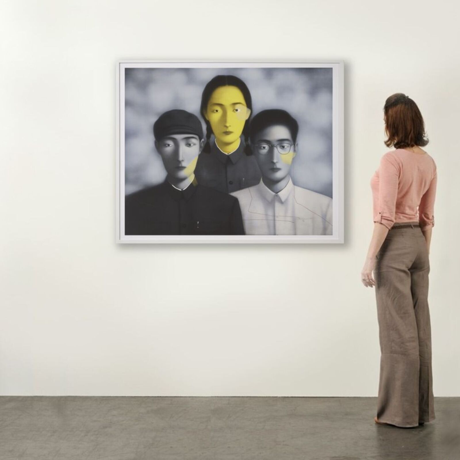 A triptych portrait featuring three figures with a striking yellow and blue color scheme.