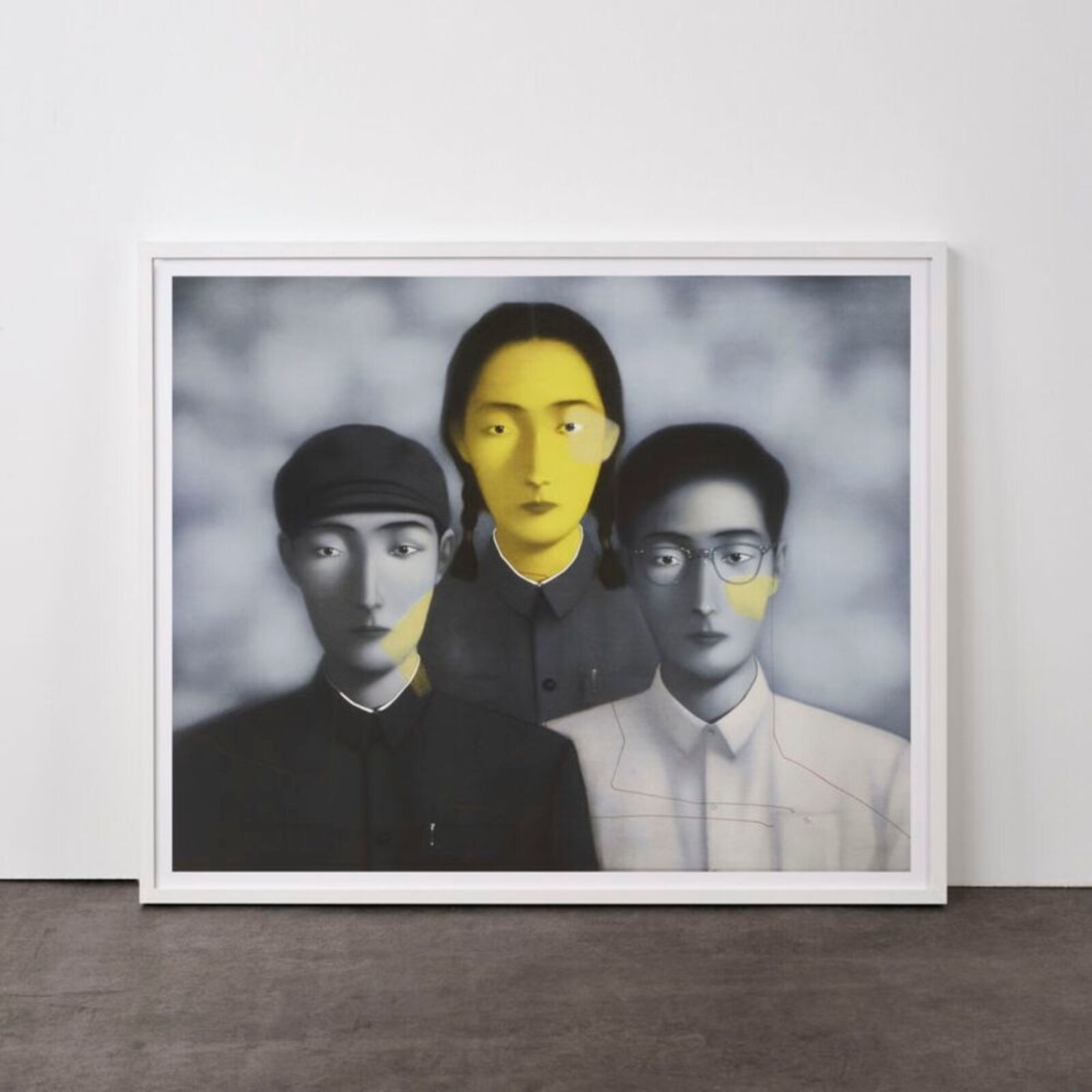 A triptych portrait featuring three figures with a striking yellow and blue color scheme.