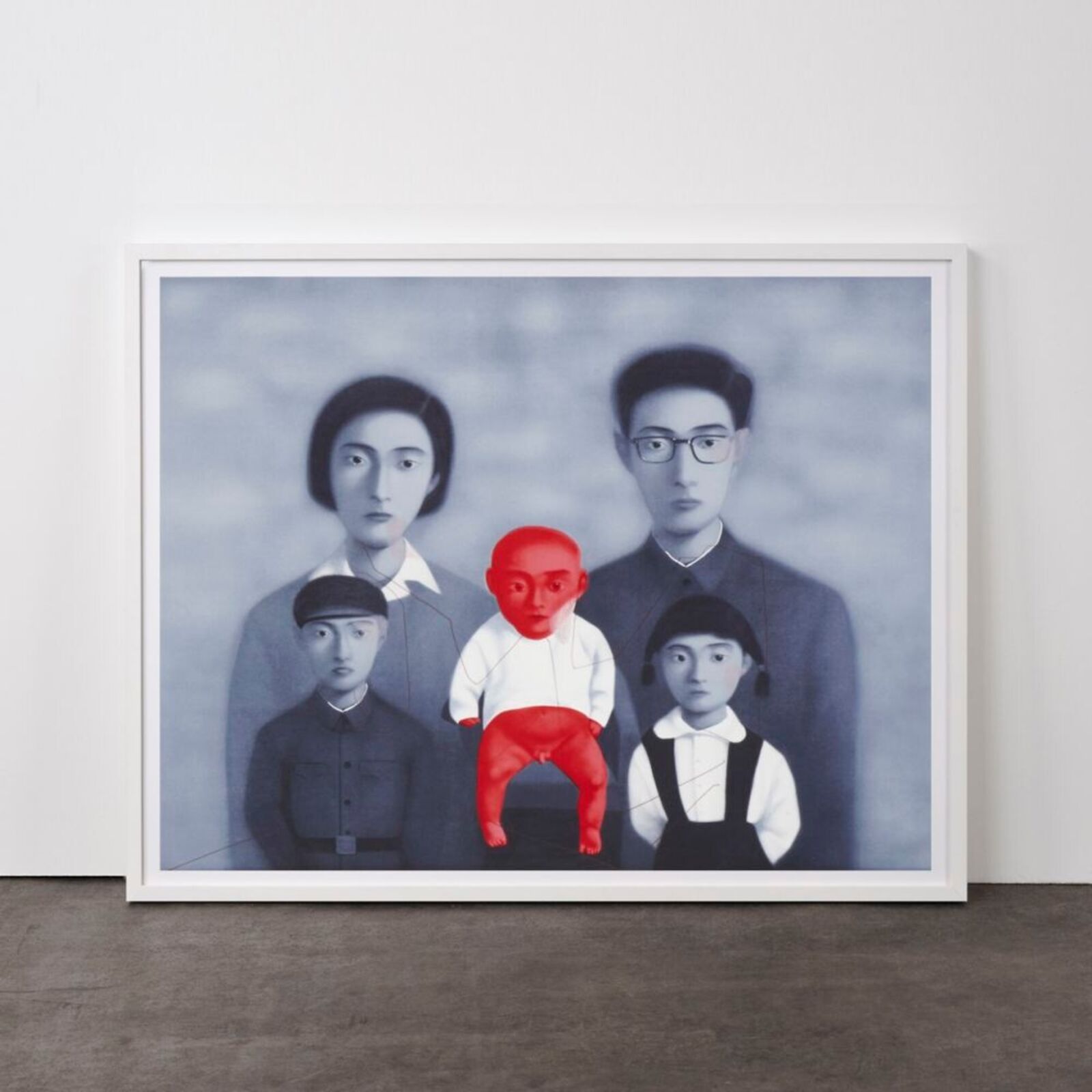 A surreal portrait of a family where one child is rendered in vivid red against a desaturated blue-grey background.