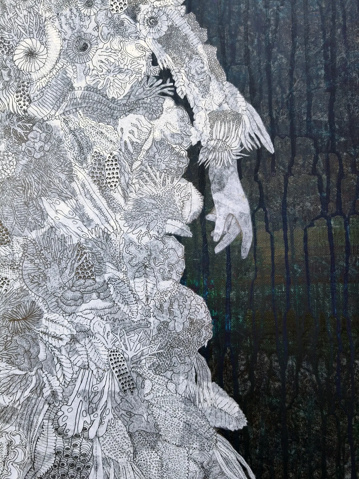A figure in a white dress stands against a dark background, surrounded by a vibrant explosion of colorful coral-like shapes.