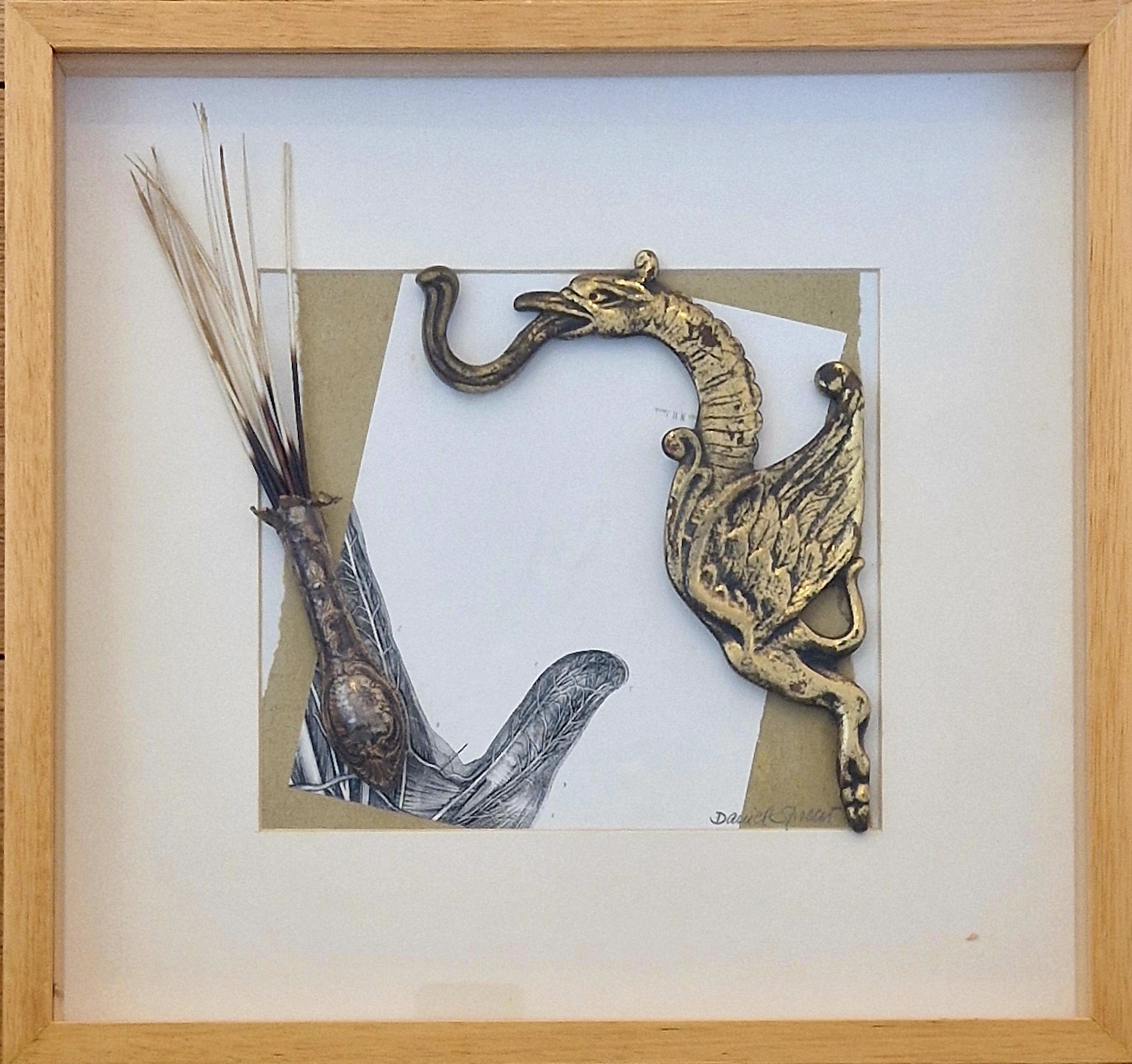A picture of a seahorse and a snake on a piece of paper.