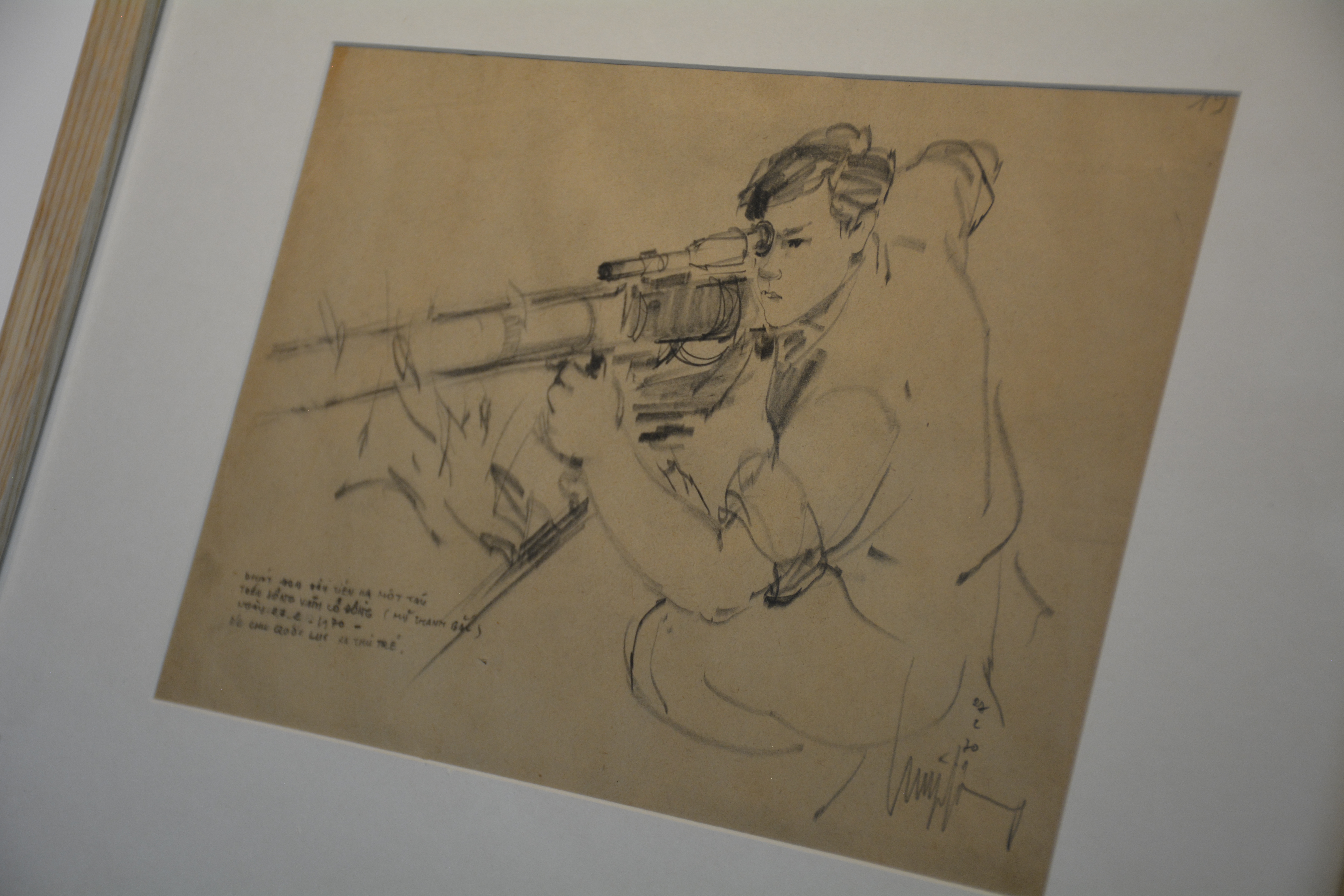 A sketch of a figure aiming a rifle with intense focus.