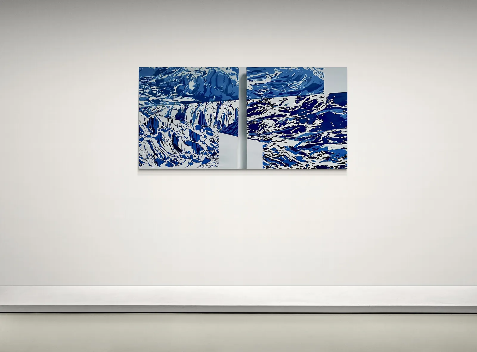 A blue and white painting of a mountain range.