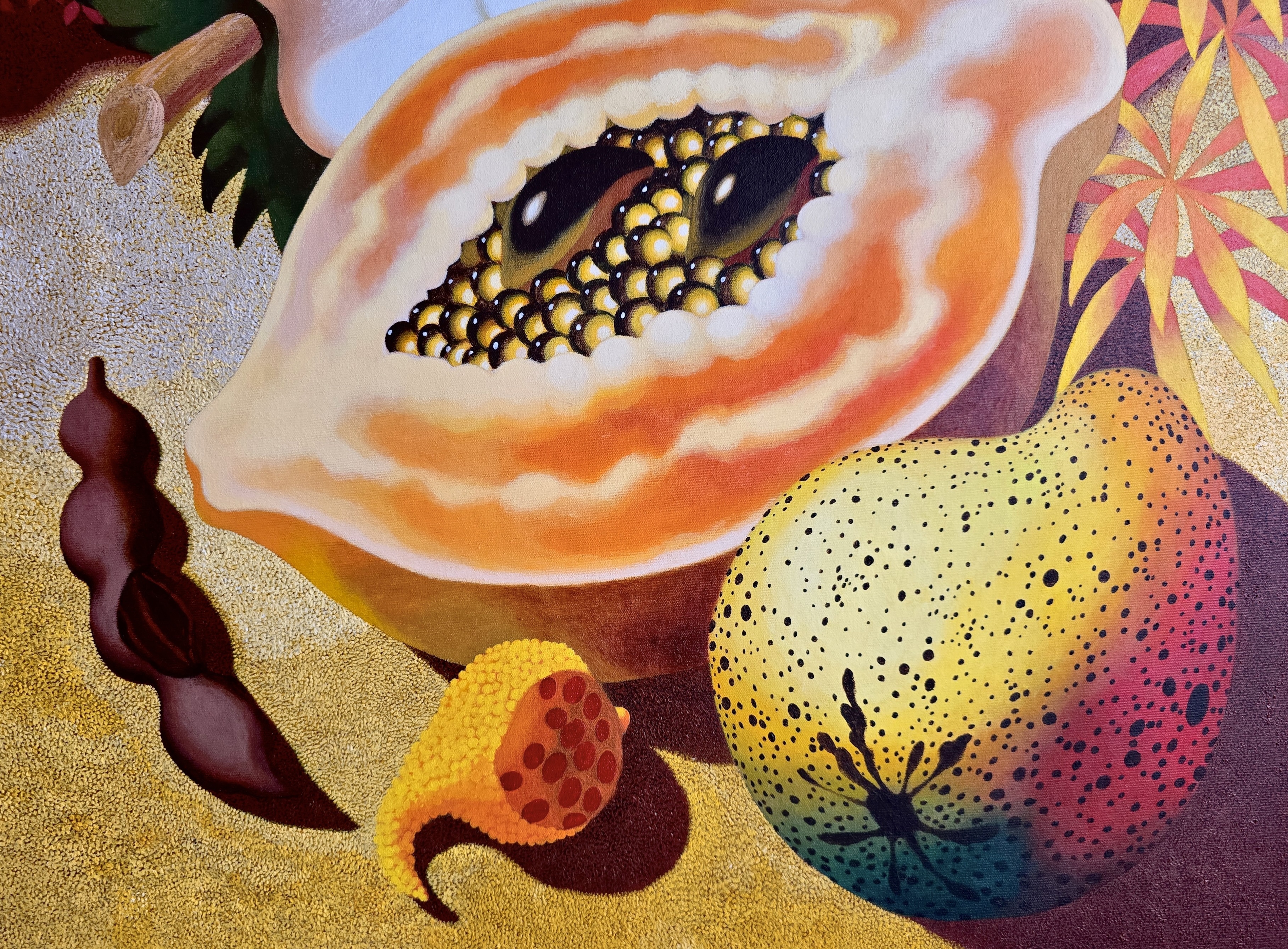 A painting of a papaya cut in half on a table.