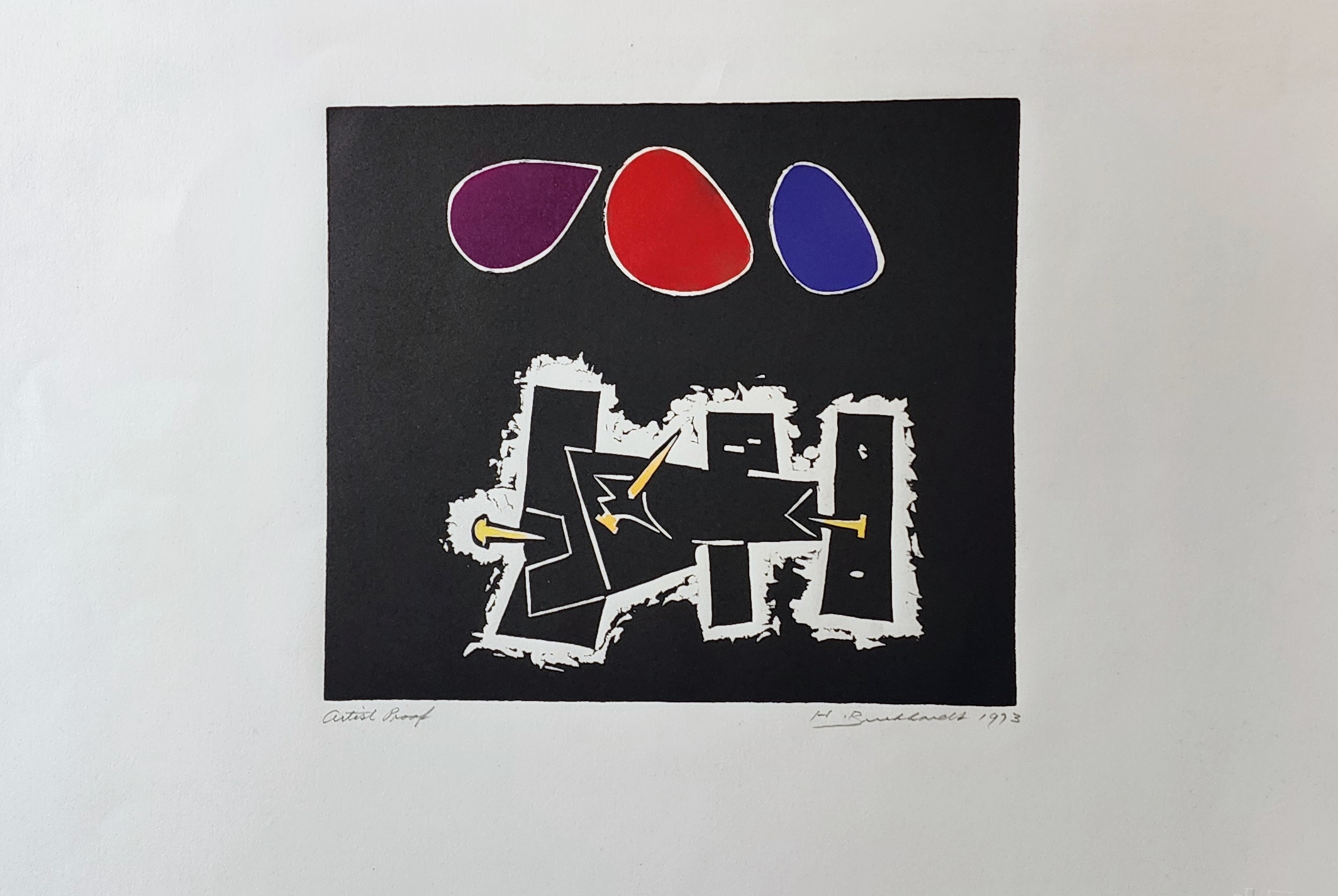 A black and white print with red, blue, and purple shapes.