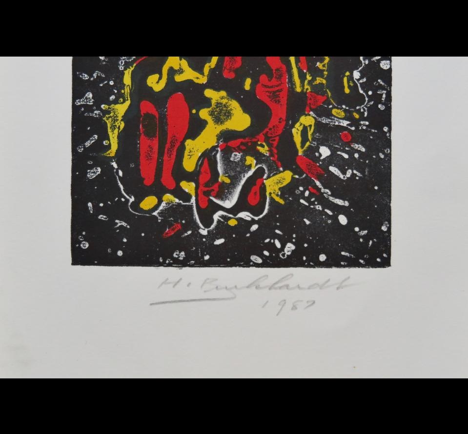 A black and red print with yellow and red paint splatters.