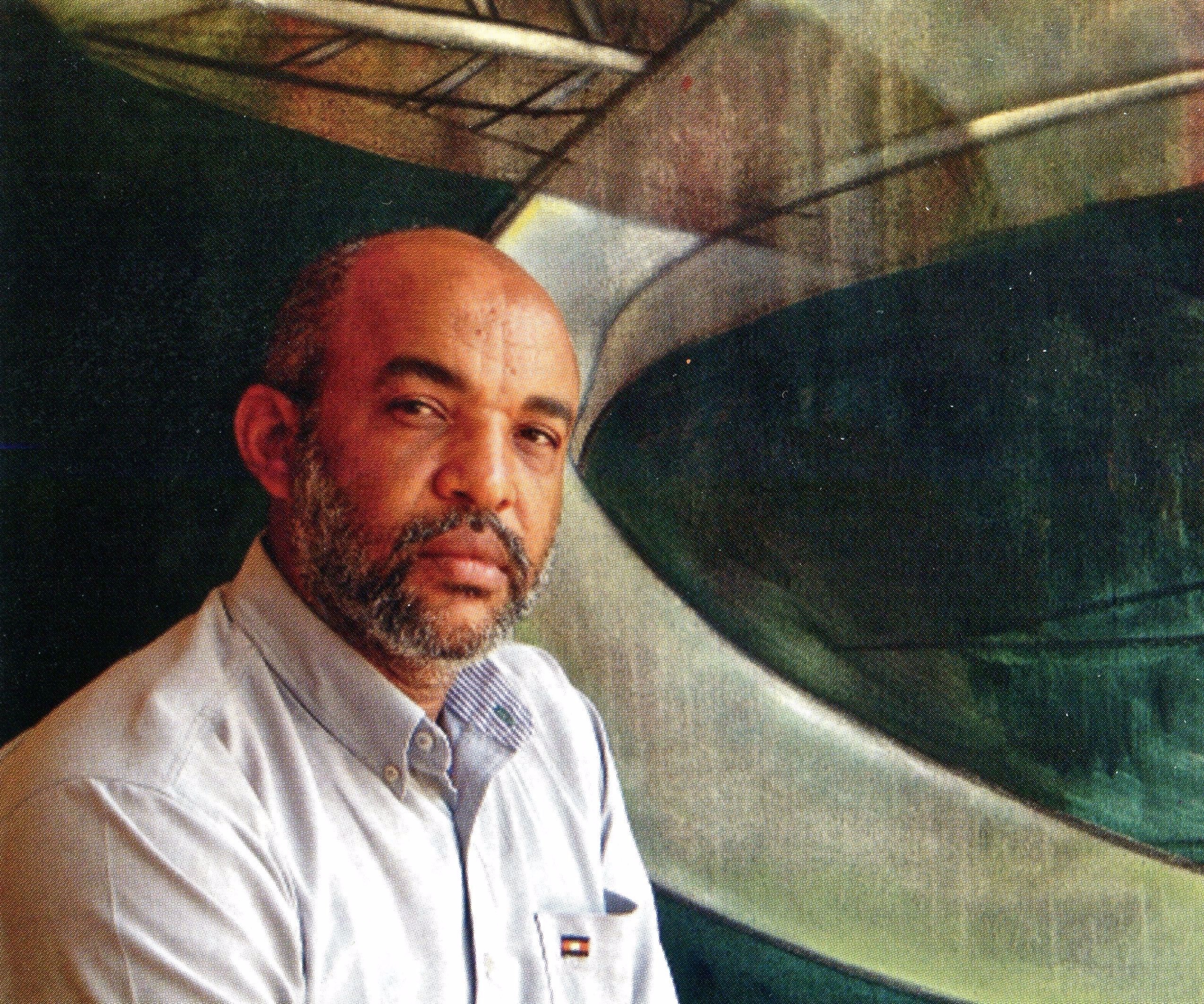 A painting of two abstract paintings on a wall. 