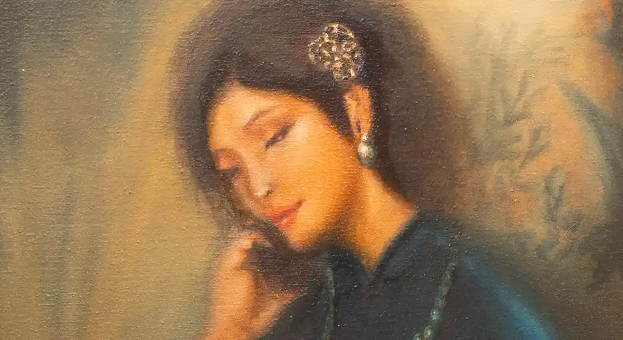A serene portrait of a seated figure in deep blue velvet, illuminated by soft, directional light.