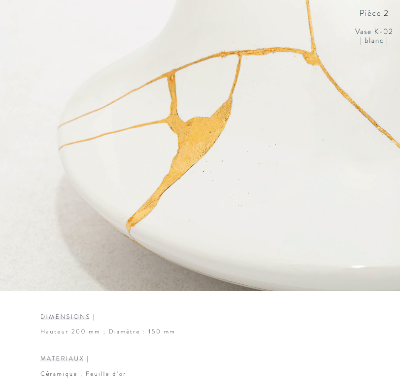 A white ceramic vase with a wide base and narrow neck, featuring a kintsugi-inspired design of gold lines tracing the cracks.