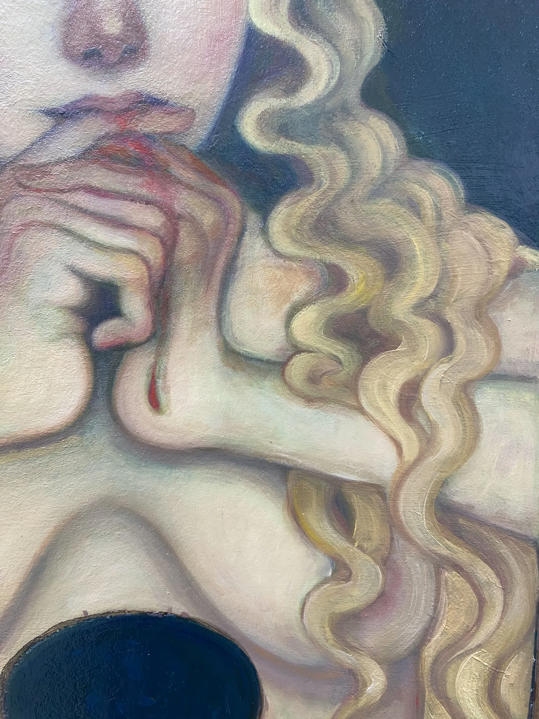 A painting of a woman with long blonde hair in a gold frame.