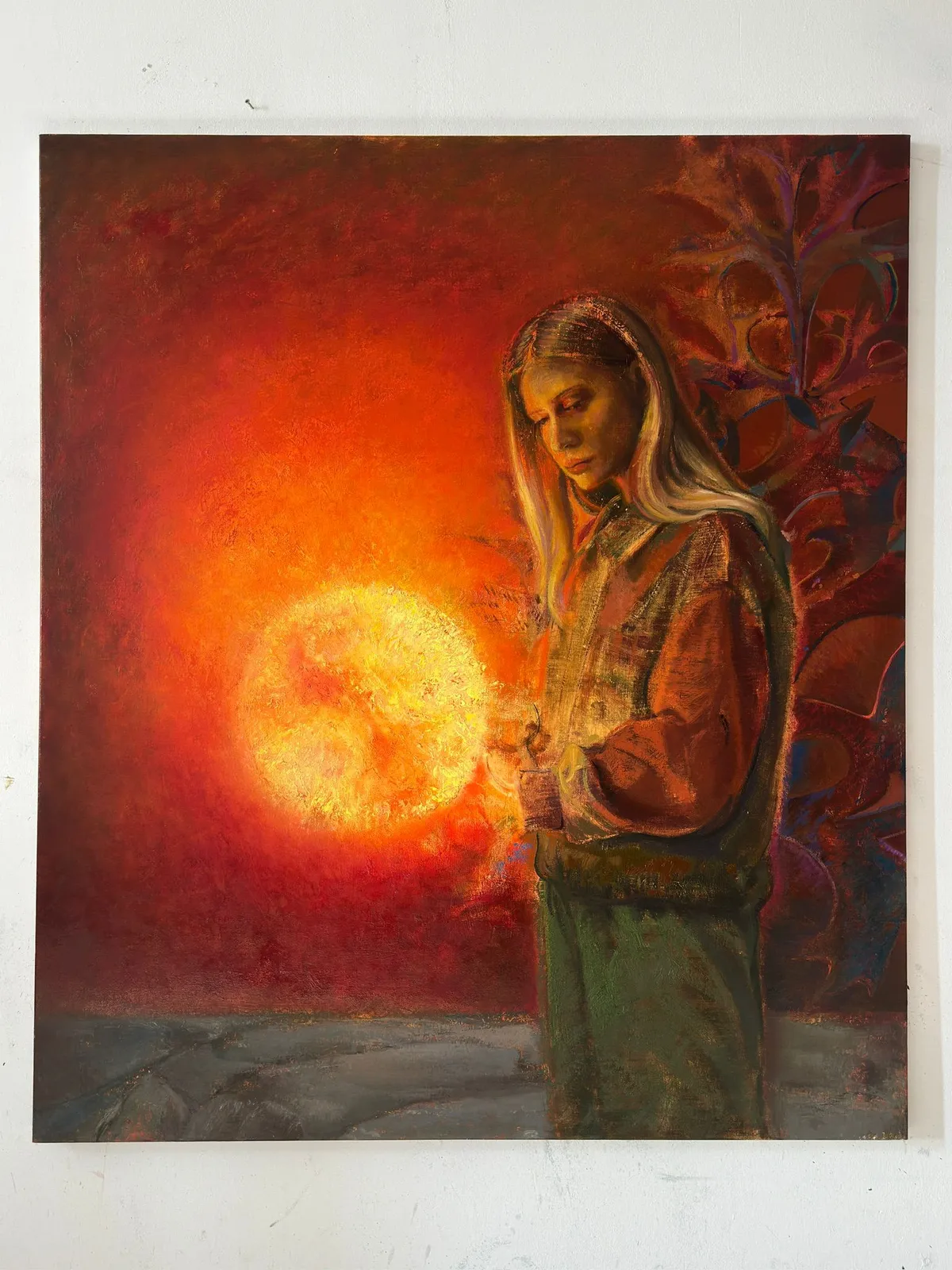 A painting of a woman holding a candle in front of a sun.