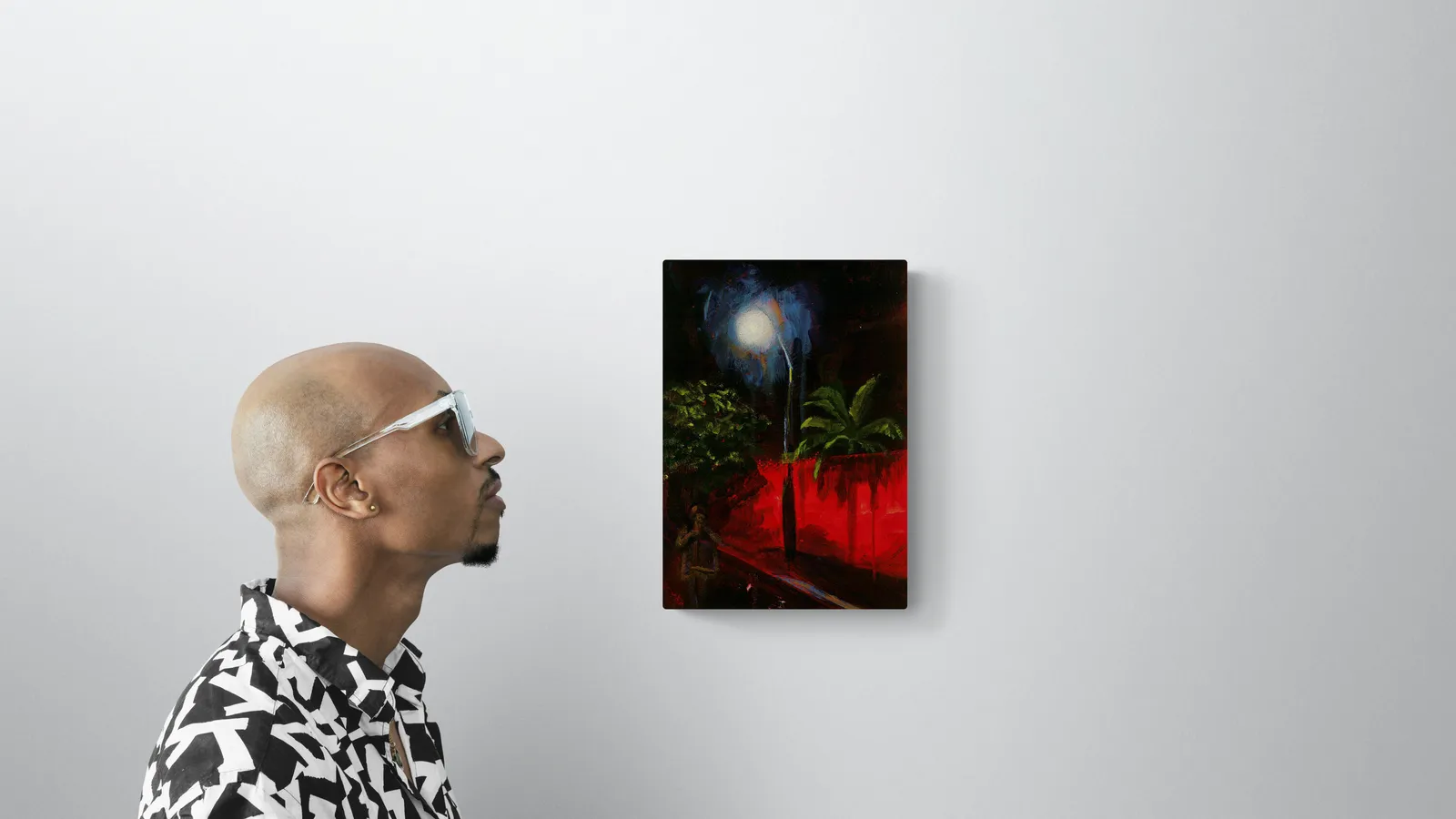 A painting of a person standing in front of a full moon.