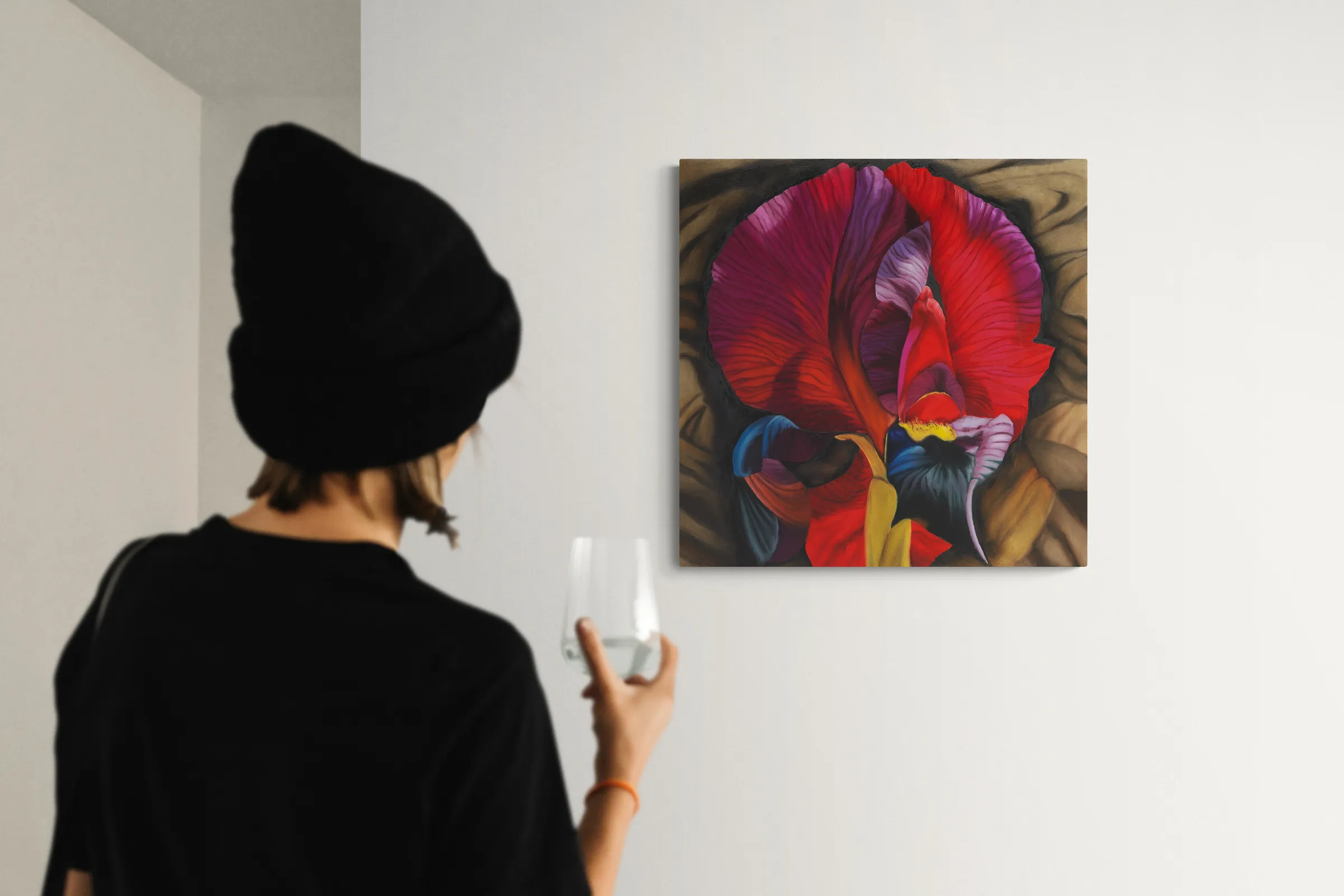 A painting of a red and purple flower on a brown background.