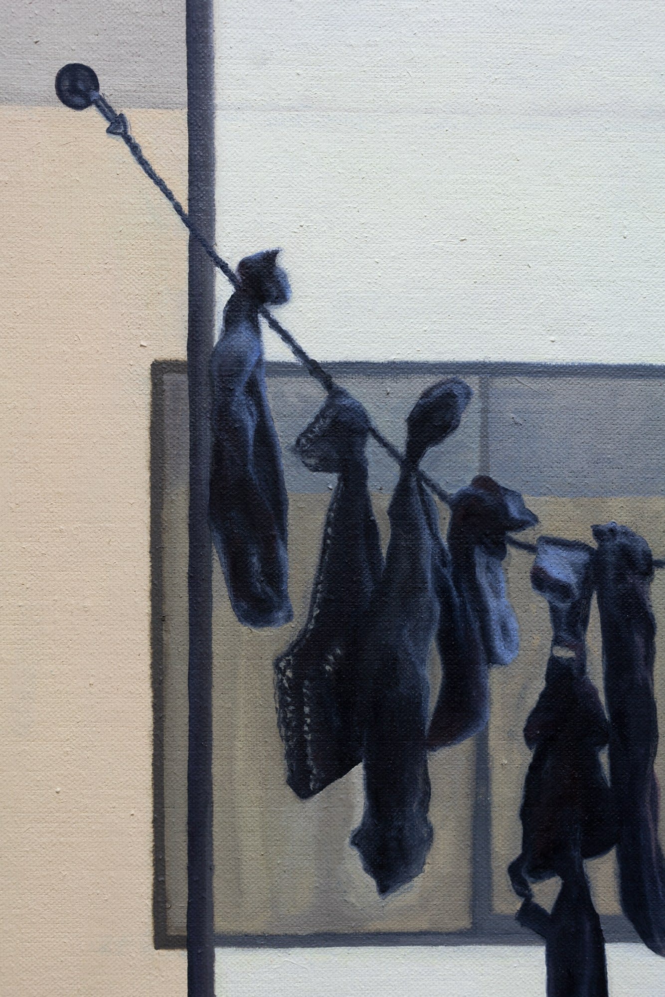A painting of clothes hanging out to dry on a clothes line.