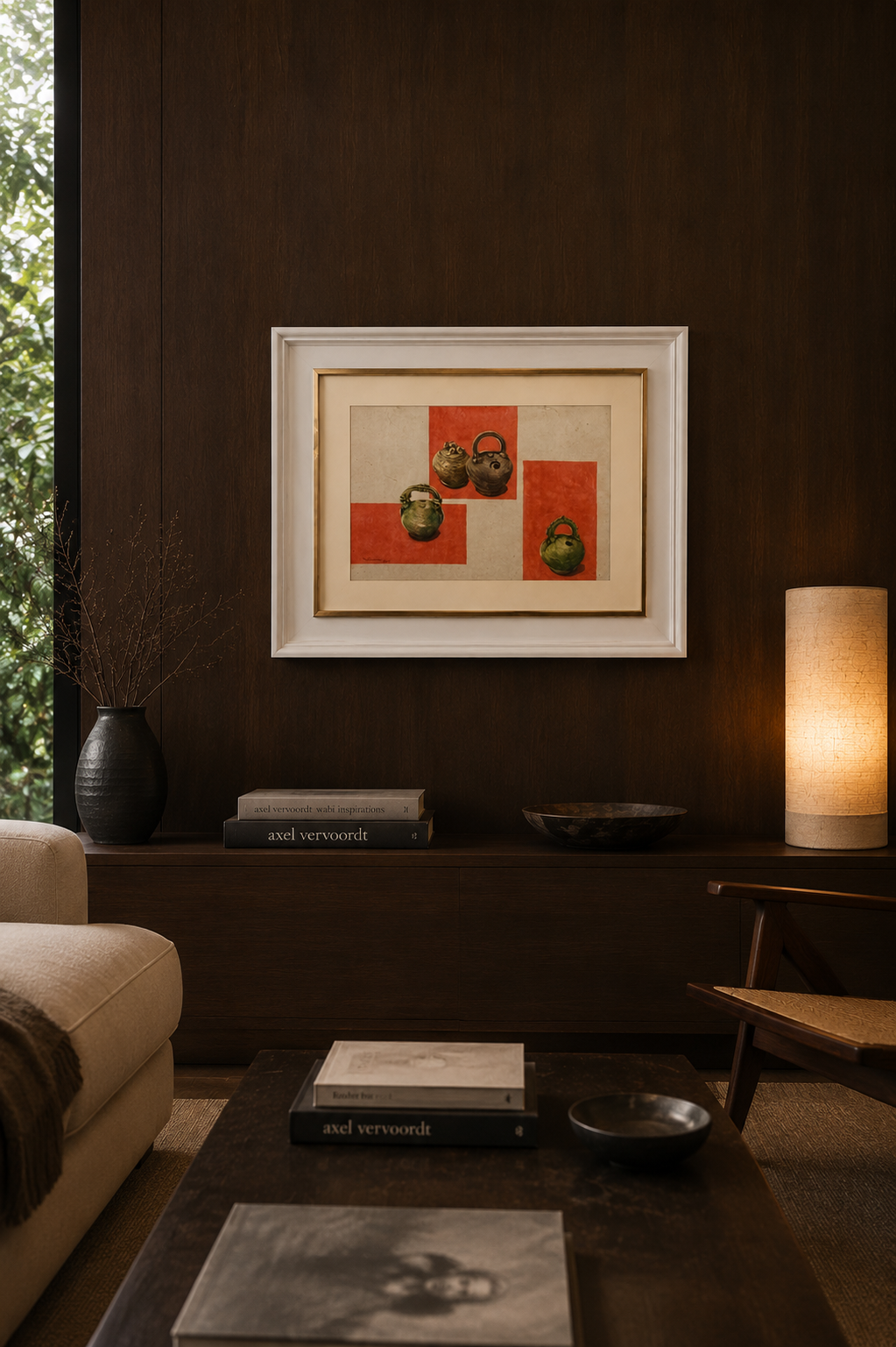 A still life composition featuring four small ceramic vessels arranged against a geometric background of red and beige squares.