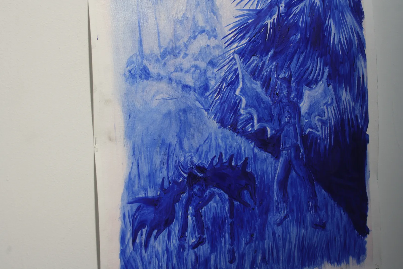 A monochromatic blue illustration of a figure with wings standing before a large spiky tree.